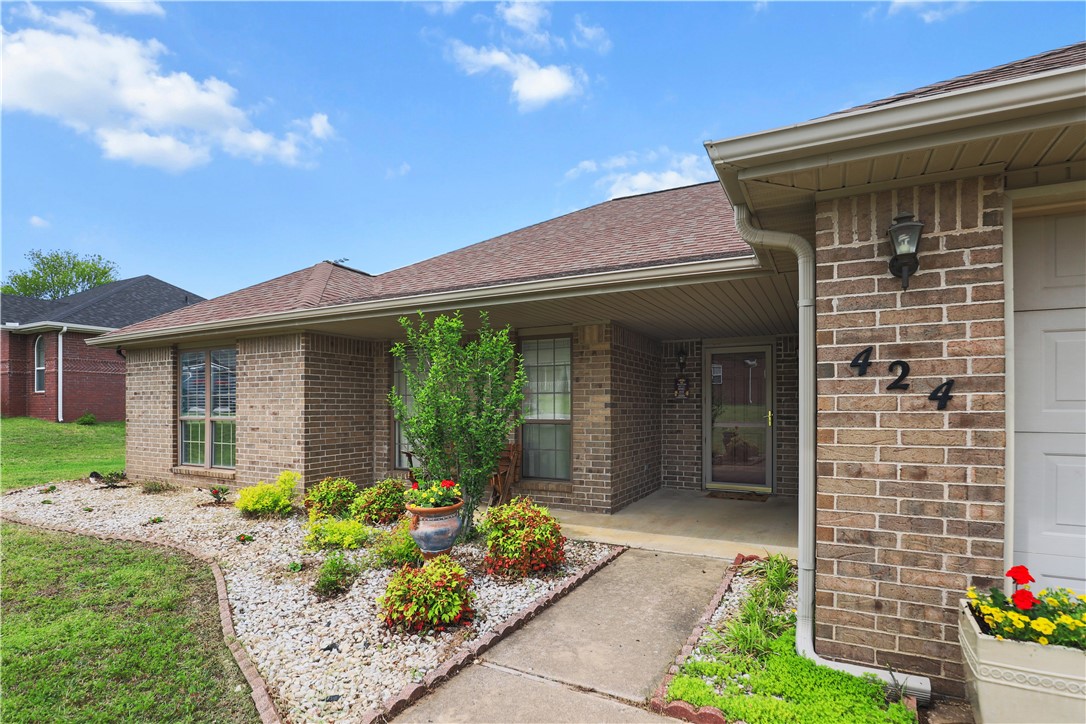 Located in Greenland city limits with Fayetteville utilities and water, this charming home offers a perfect mix of modern updates and cozy comfort. The recently remodeled kitchen features updated cabinetry, sleek countertops, and modern appliances. The laundry room has also been renovated with new finishes and paint. Most of the interior has been freshly repainted, creating a bright and inviting atmosphere throughout. Outside, the spacious backyard is a true highlight—complete with a storage shed and direct access to a park, offering extra room to play, relax, or entertain. Conveniently located just minutes from I-49, local schools, and shopping, this home blends suburban peace with city convenience. It’s move-in ready and full of charm—don’t miss your chance to make it yours!