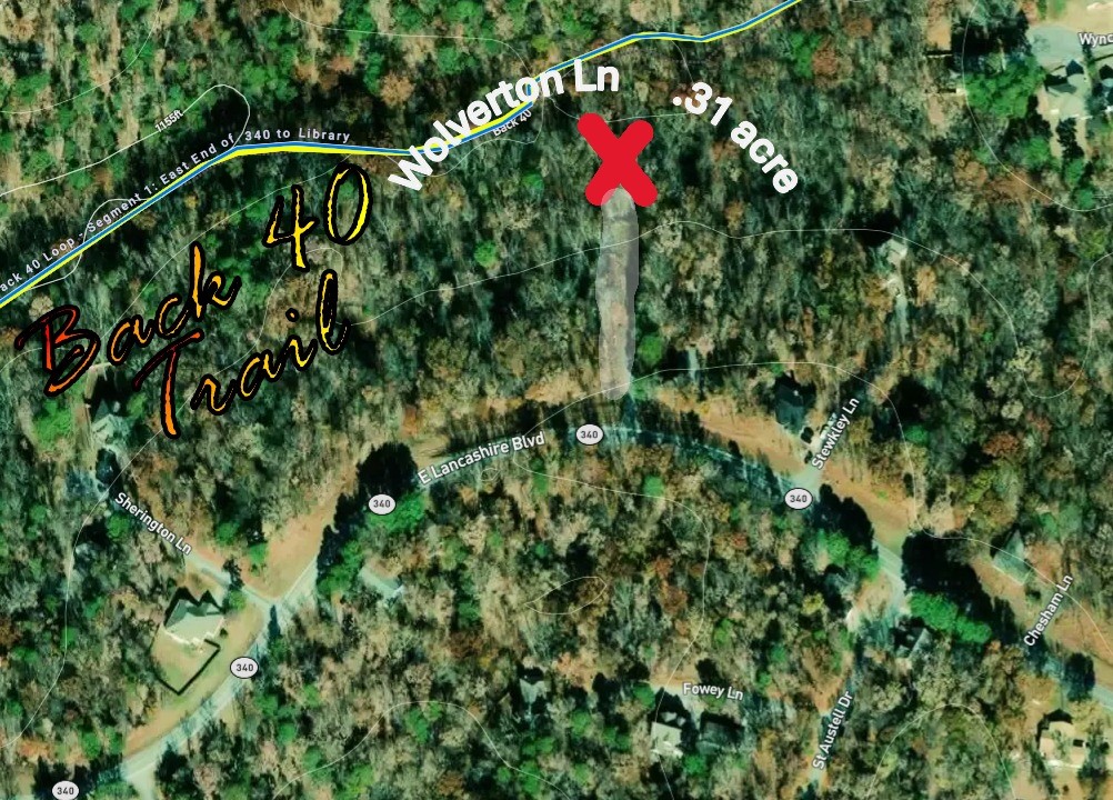 Back 40 Direct Access lot. Large lot, with an easy drive! Bentonville schools. Close to grocery, Library, golf & lakes, too!