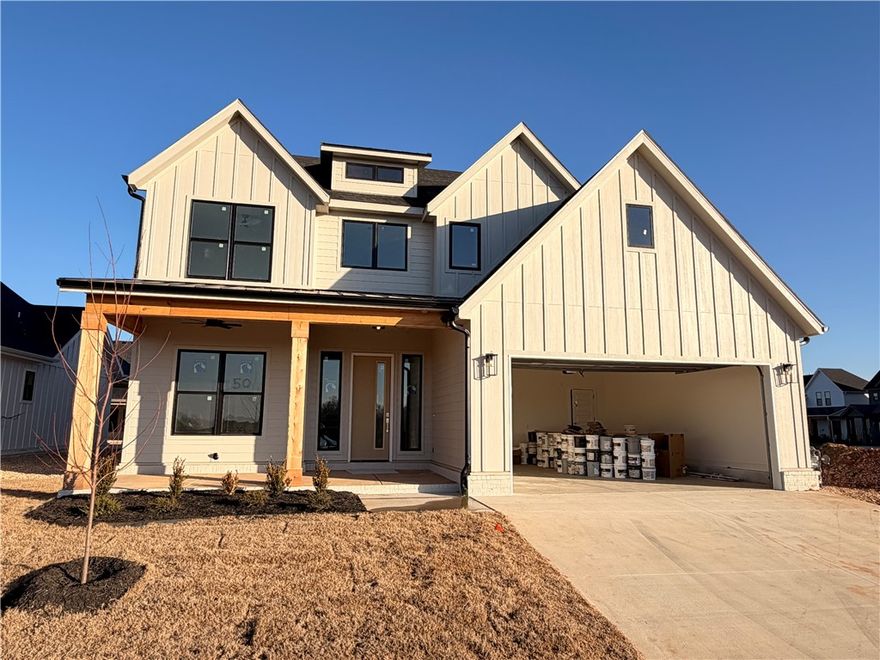 Welcome to Meadow Brook in SW Rogers! Great community in the best location! This plan features 3-4 bedrooms (2 flex spaces either bedroom 2 or study option as well as upstairs bedroom 4 or bonus room). All bedrooms have walk-in closets with plenty of storage! Downstairs you will find the primary bedroom. Great layout with open kitchen/living room area. Kitchen has large island to sit up to 6 bar stools, built-in gas cook top, built-in oven and microwave, large pantry, and eat in dining area. Primary bedroom feature en suite bathroom with soaking tub, walk-in shower, his and hers separate vanities, and large closet with lots of built-ins. Bedrooms 2, 3 & 4/bonus room are upstairs along with2 full bathrooms. Enjoy the evenings grilling on the covered back patio! Can't beat location being only minutes to shopping, dining, groceries stores, and only steps to the Razorback Greenway Trail.