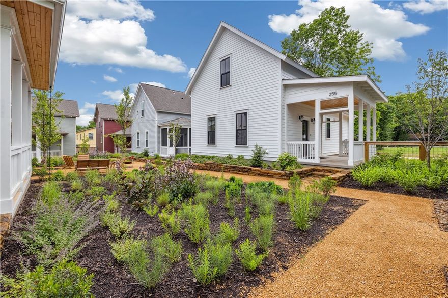 If a brand-new Net Zero home in a quiet and friendly Fayetteville community sounds appealing, you must see this one! This fully solar home is situated in the walkable/bikeable 11th Street Cottages neighborhood, surrounded by lush native gardens. Camber Cottage features primary suites upstairs and downstairs. The contemporary design boasts a spacious living room, tall ceilings, ample natural light, open-concept kitchen, generous prep space and induction cooking. Additional highlights include custom cabinetry, tasteful built-ins, and designer fixtures. The roomy screened-in front porch overlooks the common gardens and provides an outdoor living room. Private courtyard w/ direct access to private parking. ENERGY STAR certified high-performance systems with three-zone temp control for maximum efficiency, comfort and healthy indoor air quality. SunPower Equinox solar system w/25-year warranty. Call for more information about the neighborhood and available floor plans!