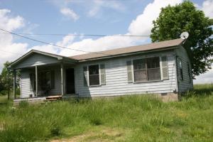 A little TLC would go a long way on this 3 bedroom 1 bath home on 2.43 acres.