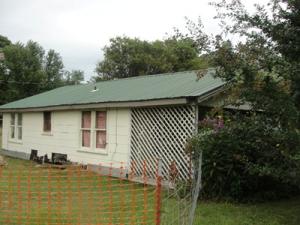 Great corner lot location! Being offered ''as is''; Fixer-Upper! Would make a good rental property.