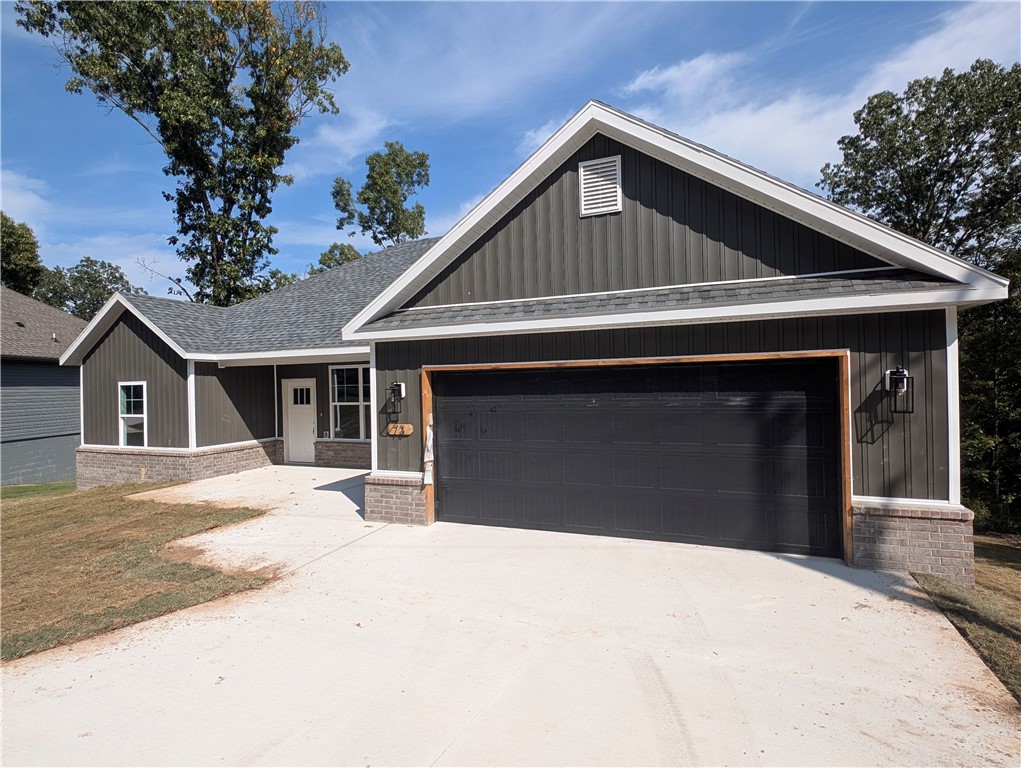 Discover your dream home in beautiful Bella Vista, Arkansas! This stunning new construction 3-bedroom, 2-bath home combines modern comfort with timeless charm, featuring a durable brick and vinyl exterior and elegant quartz countertops throughout. Enjoy the ambiance of the electric fireplace, and stay organized with the spacious walk-in closet in the master bedroom. Nestled just minutes from Lake Windsor, it’s a perfect retreat for fishing enthusiasts. With a scenic park nearby, outdoor recreation is always within reach. Don’t miss your chance to own this exceptional property in one of Bella Vista’s most desirable locations!