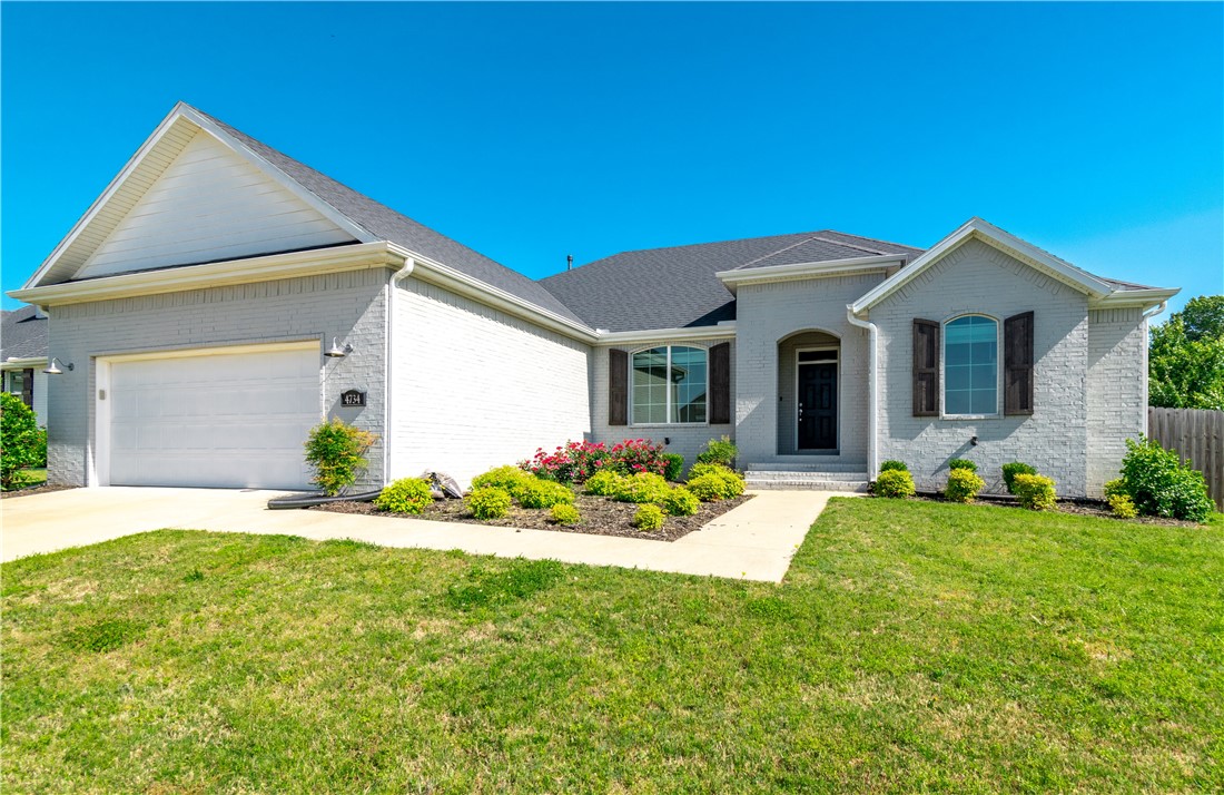 Beautiful all brick home on a large corner lot! Home is directly next to a large open greenspace! Neighborhood features a community pool, playground, tons of greenspace, and miles of sidewalk perfect for evening strolls! Location feels secluded, yet only minutes to i-49, shopping, dining, HWY 112, U of A, trails, parks, and more! The home itself stands out for its spacious open floor plan, large vaulted ceiling with shiplap and wood beam accents, big kitchen island overlooking the living room, 5 burner gas cooktop, built in oven & microwave, custom built cabinets, beautiful quartz countertops, engineered hardwood floors, large picture windows allowing an abundance of natural light, an extended oversized patio with both covered and uncovered sections, large bedrooms, huge master closet, built in soaker tub with marble look tile surround, a jack and jill bath, and so much more! Stainless steel French door refrigerator, washer & dryer included! Don't miss out on this great home in the heart of Fayetteville!