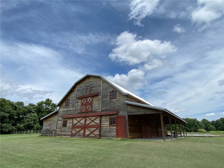 Wedding and event venue with acreage and room to expand. 3300+ SF Hilltop climate controlled Barn on 23+ acres with fantastic views and opportunity potential for growth. New Gated entry. Land has several acres of open pasture as well as acres of tree-lined creek-side. Facility has Bridal / dressing room, 2 baths, & prep kitchen. Interior 4 rooms climate controlled plus internal AC units for common area. Gravel parking lot and ADA compliant facilities. Daily operational approval with 175 person occupancy. Current owners focused on weddings, but space applicable for other uses - events, retreats, and line dancing. Future expansion could include cabins and other facilities.