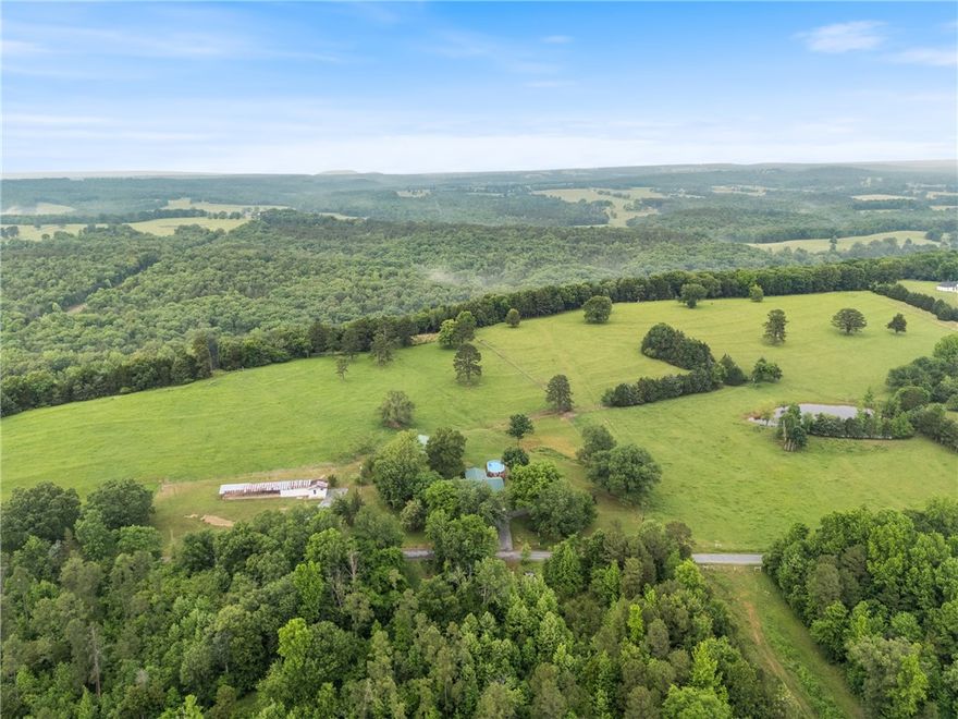 Stunning 56-Acre Farmstead with Waterfront Cadron Creek Access in Central
Arkansas
Just 7 minutes from the award-winning Quitman School District, Cadron Meadows Farm
offers tranquility and scenic beauty across 56 breathtaking acres. Enjoy stunning
sunsets over 26 lush fertile acres of cross-fenced pastureland with 2,500 ft of serene
year-round Cadron Creek frontage.
The Home: Fully remodeled 1,972 sq ft, 2-bed, 2-bath home on a private 3-acre
homestead featuring a modern kitchen, updated baths, spacious sunroom, beautiful
outdoor carpatio, landscaped beds, garden, and relaxing pool.
Farm Facilities: 1,500 sq ft barn with finished office above a spacious
workshop/storage; 1,200 sq ft restored dairy barn; deep water well dedicated for
livestock irrigation.
Livestock and Features: Operating Irish Dexter cattle farm with 7,000 ft of fencing (half
electrified), 15 gates, cattle pen area, four pastures with pond, plus 27 wooded acres
ideal for hunting, hiking, and creek recreation.
