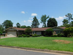 STARTER HOME If your looking for something around 100K here it is the paint is still drying. Home sits nicely on a corner lot not far from downtown. Kitchen and bathrooms have been remodeled and the floors are gorgeous. Owner Finance is an option on this house with a nice down payment.