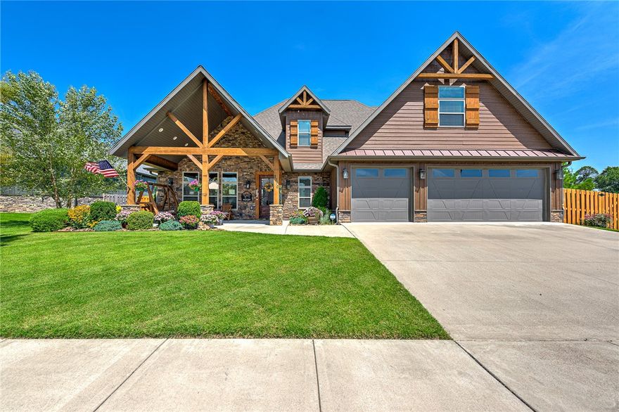 BACK ON THE MARKET! A captivating rustic-modern retreat nestled in the heart of Big Sky! This immaculate 4-bedroom, 3.5-bath home offers a perfect blend of charm and sophistication. Step onto the large inviting porch and feel the serene ambiance surround you. The back patio, set on a spacious lot, is an ideal spot to unwind, located conveniently next to the community pavilion.
Inside, the home boasts an awe-inspiring custom kitchen with floor-to-ceiling cabinets and a double island, creating a chef's dream. Ample storage space throughout ensures clutter-free living. Enjoy the luxury of dual primary suites, each located on a separate floor, providing privacy and convenience.
Entertain family and friends in the expansive flex/media room, perfect for movie nights or hosting gatherings. Whether you seek relaxation or entertainment, this home has it all. This home is just a short drive from Bella Vista Bypass, minutes away from Benton West High School, and 15 minutes from the new Walmart campus.