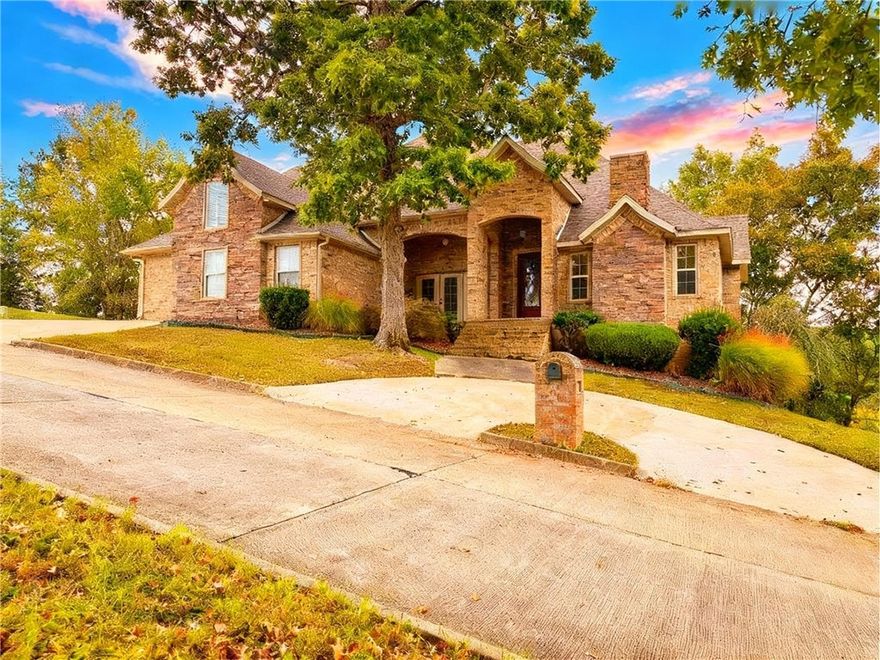 Welcome to your dream lake home! This exceptional property offers breathtaking views of Beaver Lake, providing the perfect blend of tranquility and luxury living. Step inside to discover spacious, light filled interiors with soaring ceilings, elegant finishes, and expansive windows that frame the sparkling water. Enjoy your very own boat slip in the shared 7 slip community dock. The gourmet kitchen is a chef’s dream, featuring granite countertops and custom cabinetry.
Enjoy seamless indoor-outdoor living, ideal for entertaining or simply soaking in the serene surroundings. The primary suite is a true sanctuary, boasting a spa inspired bathroom. Additional highlights include a cozy fireplace, with a split bedroom layout. 
Located in a peaceful, upscale community, you’re just minutes from Prairie Creek Marina and Downtown Rogers. 
Don’t miss your chance to own this slice of paradise on Serenity Point Lane, where every day feels like a vacation! 
Prefered lender incentive: $7k lender credit + free appraisal!