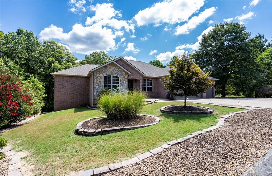 Up to $5,000 preferred lenders credit available! This beautiful 3  BR home is again on the market. With 3.5 baths on a 2 bedroom septic plan  This lovely home has all new carpet on the lower level, professionally painted walls, trim, and ceiling throughout, & a newly installed home theater. In the past 3 years, the roof was replaced with extra durable shingles, the carpet was swapped for hickory hardwood floors, & Trex decking on the upper deck. The 1st floor features an open concept with 2 large ensuite bedrooms with 2 baths, a dining room, office, 1/2 bath & a spacious kitchen perfect for gathering with family and friends. The lower level includes a home theater, an office & a 3rd bedroom w/closet, a wet bar, & large shelved storage area & workshop. This move-in-ready home is adjacent to Scottsdale golf course, close to boat ramp & walking trails. The nearly level lot backs up to a wooded POA area and is adjacent to privately owned wooded acreage. Covered patios provide access to secluded outdoor living.