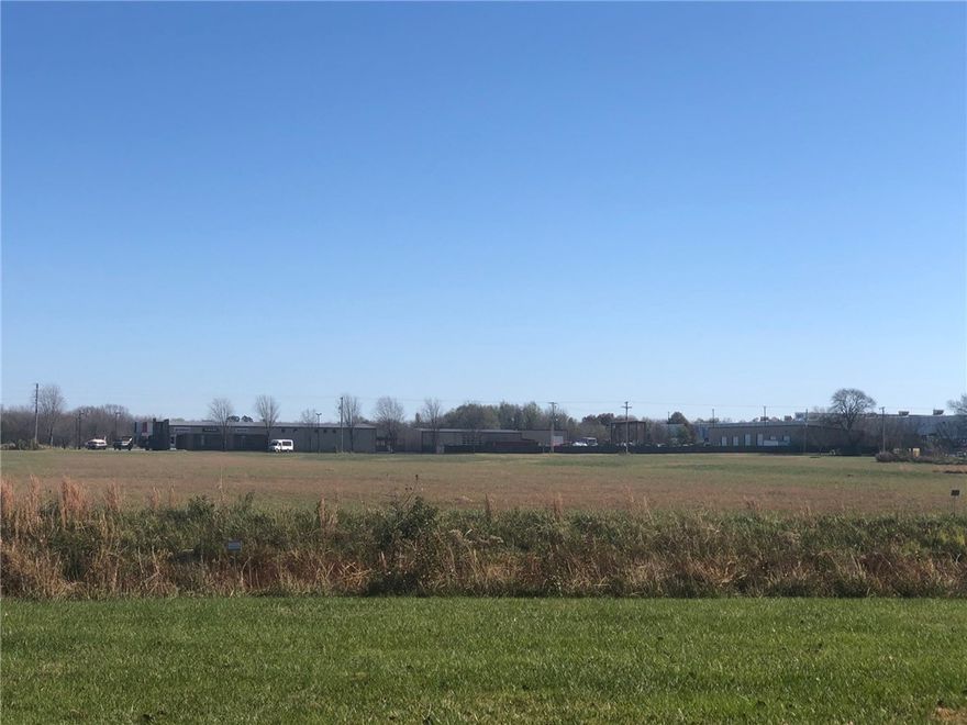Development Potential on this 7.55 acre parcel. Level, open and ready to build on. Major road frontage on Hwy 102 (W. Hudson Rd). One of the last good parcels of land on this road. Come build on this great property. Property has road access from N.12th St.