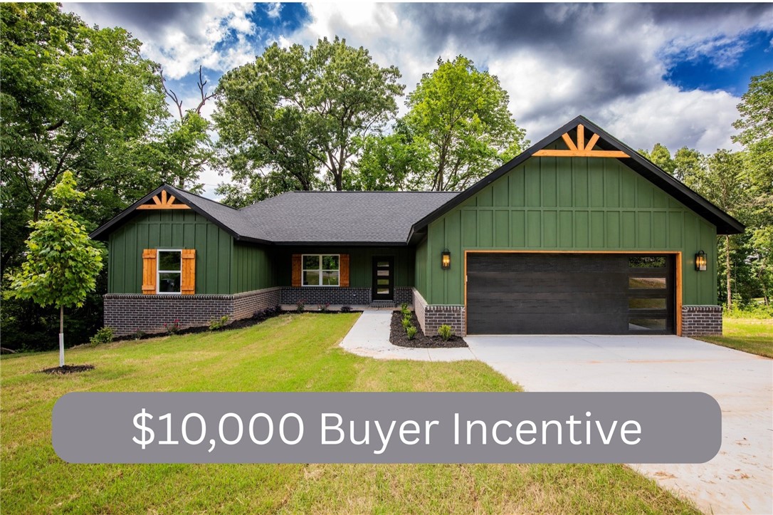 $$10,000 Buyer Incentive!! Come experience all the amenities Bella Vista has to offer, which includes seven golf courses including a world class practice facility, seven private lakes, miles of hiking and biking trails, swimming pools, a beach, parks and much more. This gorgeous three bed, two bath secluded home offers tons of upgrades like wood beams on the vaulted living room ceiling, electric fireplace, gas cook top, unique granite, beautifully painted custom cabinets, wood flooring in the main areas including the primary suite, large soaking tub and walk-in shower in the primary bath. There is a pre-wired blank outlet in garage for EV. Relax on the covered back deck.
