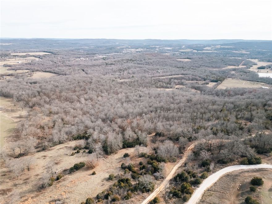 A rare opportunity to own 20 acres on Kessler Mountain Road, just a quarter mile from the trailhead at Kessler Mountain Park! This beautiful property offers breathtaking views of the Boston Mountains, providing the perfect backdrop for your dream home or a private retreat.

Located just outside the Fayetteville city limits, this land offers the tranquility of nature while being only 10 minutes from downtown Fayetteville and the University of Arkansas. Whether you're looking to build a personal residence, multiple cabins, or an investment property, this location is hard to beat. City water will be available at the property once the water line is extended up the road.