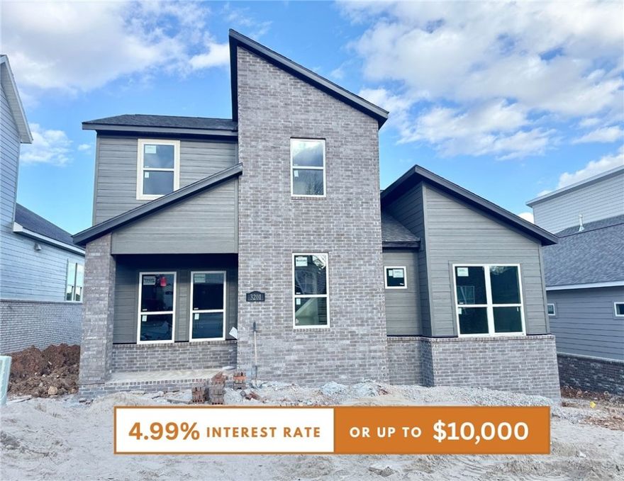 Discover this stunning modern home in the perfect East Fayetteville location—just a short walk to beloved Gulley Park! Ewan floorplan featuring designer finishes throughout! Enjoy a spacious open floorplan with a large living room, electric fireplace with accent wall, and beautiful wood flooring. The chef’s kitchen boasts 3cm quartz countertops, stainless steel frigidaire professional-grade appliances, custom cabinets to the ceiling with soft close hinges, vented hood, and a walk-in pantry. The luxurious primary suite includes hardwood floors, custom beams, and a spa-like bathroom with walk in tile shower, soaking tub, double sinks and walk in closet. With a formal dining area with accent wall, loft upstairs for relaxing, cubbies to keep you organized, large covered patio, and included blinds and gutters, this home blends comfort, style, and convenience in one unbeatable package. POA maintained lawncare!