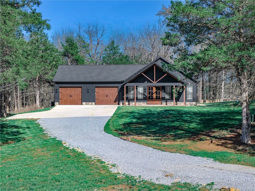 OPPORTUNITY! Live in this custom 1200 sq ft home while enjoying the benefits of an amazing hobby farm. This unique property offers a high-quality, efficient residence today while preserving the potential for future expansion. This "compound -style" layout allows you to live on-site in a fully-equipped, modern home while you take your time to designing or funding a larger primary residence. This property includes natural gas! (no propane needed), a water tap, and well. Be sure to review the Special Features sheet for all the top -rated amenities. This property could also make an excellent Airbnb, or additional living space for family members once a larger home is built.