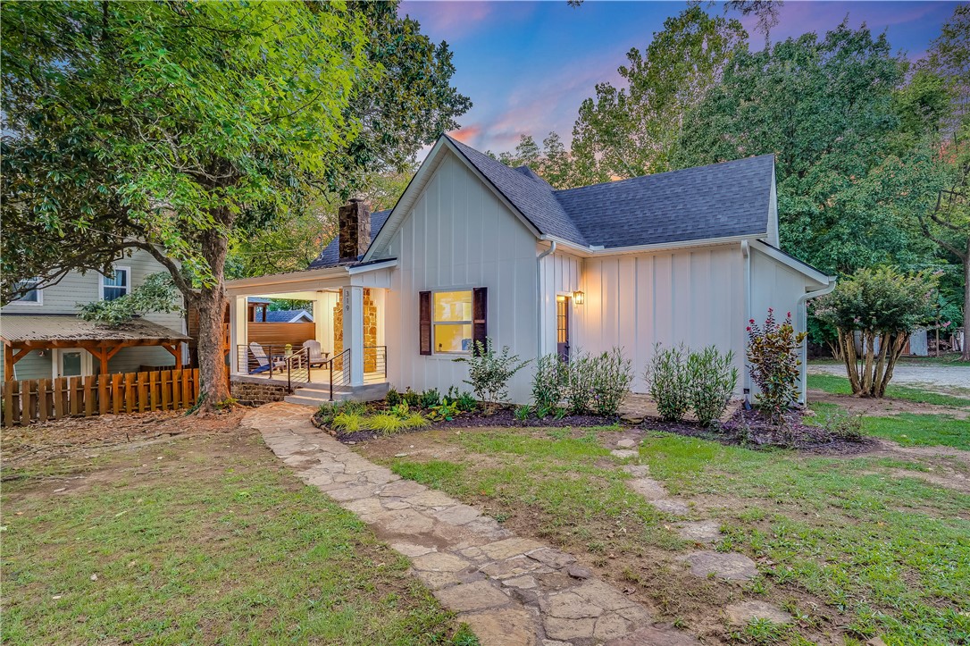 Unbeatable location close to downtown Fayetteville! This historic home has been completely redone down to the studs, offering the charm of original details with the comfort of modern updates. Step inside to find original hardwood floors, quartz countertops, and custom cabinetry throughout.
The bright eat-in kitchen features a custom built-in bench, perfect for casual dining or hosting guests. A versatile bonus room provides the ideal space for a home office, library, or additional living area. Upstairs, the bedrooms are spacious and thoughtfully designed, including a primary suite with updated finishes.
With its combination of historic character, high-end updates, and walkability to Fayettevilleās best shops, restaurants, and entertainment, this property is a rare opportunity in one of the cityās most sought-after neighborhoods.