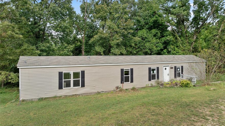 If you’re looking for a comfortable home with room to spread out, this 2-bedroom, 2-bath modular home on 5 acres could be the perfect fit. The home offers a straightforward, functional layout with an open living area, eat-in kitchen, and two full bathrooms. It provides everything you need in a manageable space.

The real draw is the land—5 private acres with plenty of room to enjoy the outdoors. Whether you’re looking for an affordable starter home, downsizing, or just want some breathing room away from town, this property delivers.

Approved borrowers will receive a closing cost credit of 1% of the loan amount up to $5,000 on their Closing Disclosure on their loan closing with Envoy Mortgage Branch NMLS #2659248 and Branch NMLS #2579798.