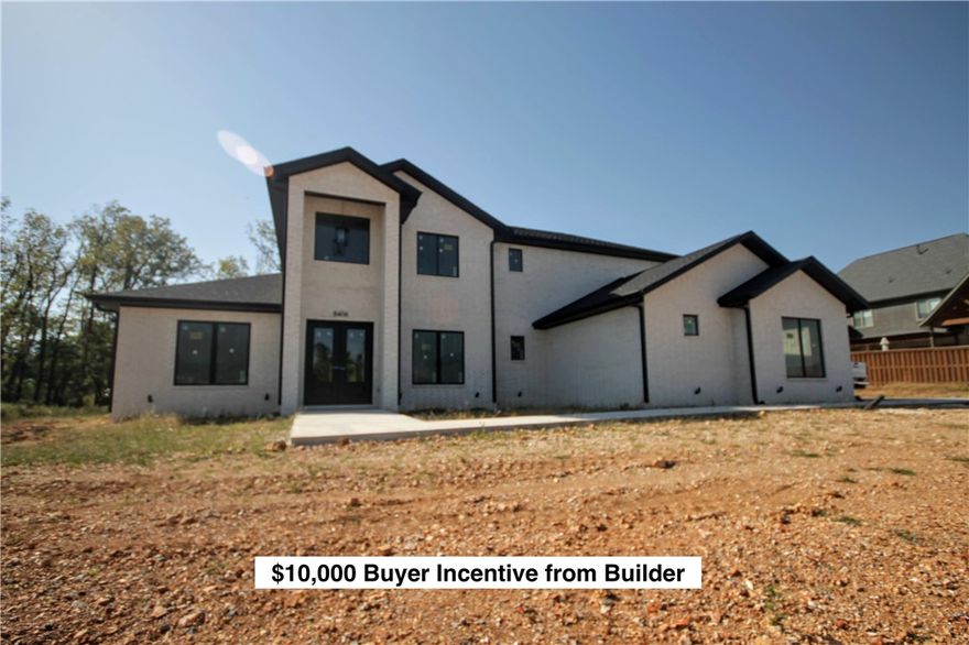 $10K Buyers Incentive from Builder. Use how you want for closing cost, pre-paids, interest rate buy down or approved upgrades. Estate home in the highly sought after gated community of Scissortail. 3 car garage, large bedrooms with walk-in closets and their own bathrooms and bonus room with wet bar on the main level! Large living room w/ modern tile linear fireplace, wood floors with natural finish and custom painted wood beams. STUNNING bathroom suit with soaking tub, huge walk in tile
shower with double shower heads and rain head, tons of storage and massive walk-in closet with access to the laundry room. Secondary bedroom on the main level with luxurious bathroom. All the features you want including a secondary utility room upstairs, home audio, central vac, upscale appliances
with a chef range gas burner cooktop, griddle, quartz counters, stand alone freezer and refrigerator and double ovens. Enjoy entertaining on the large covered back patio with built in grill overlooking the over half an acre private yard!