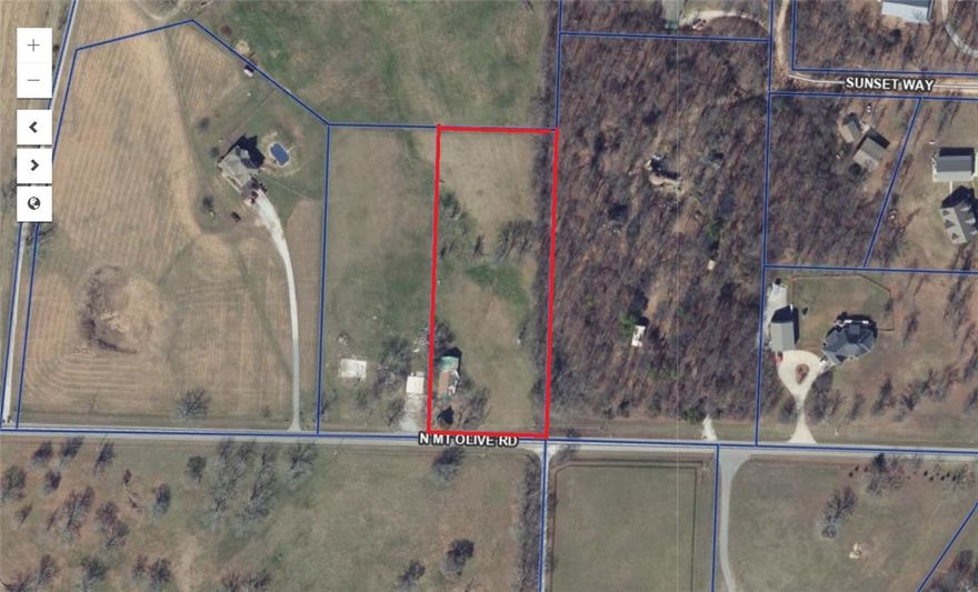 2.5 acres beautiful rolling hills to build your dream home on . Will build to suit. Water in street, Septic needed . No Manufactured homes allowed Survey attached