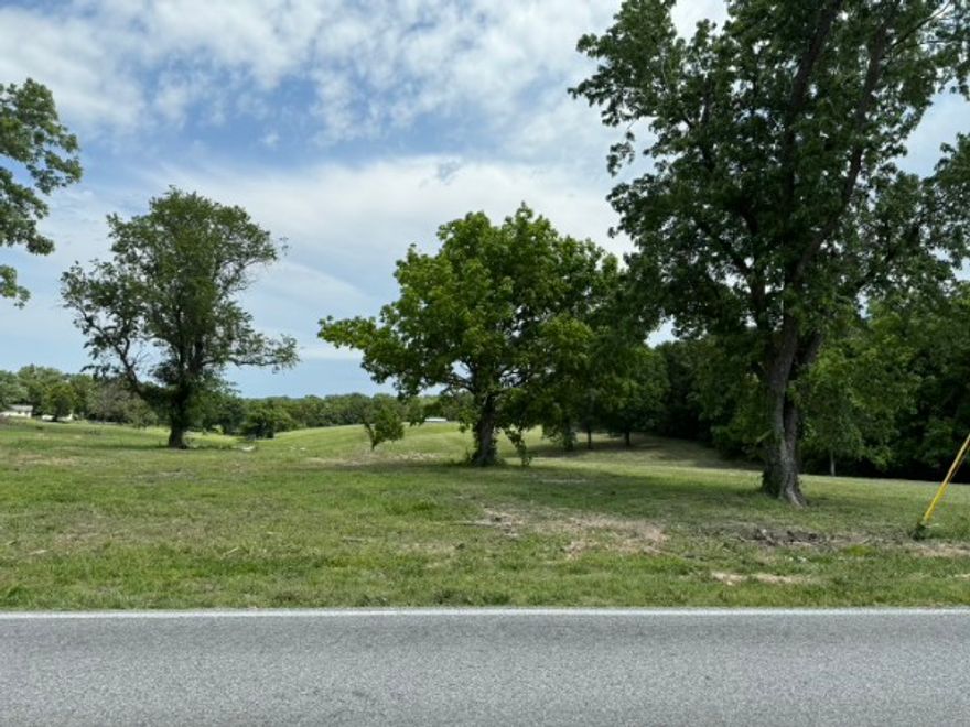 2.5 acres beautiful rolling hills to build your dream home on . Will build to suit. Water in street, Septic needed . No Manufactured homes allowed Survey attached