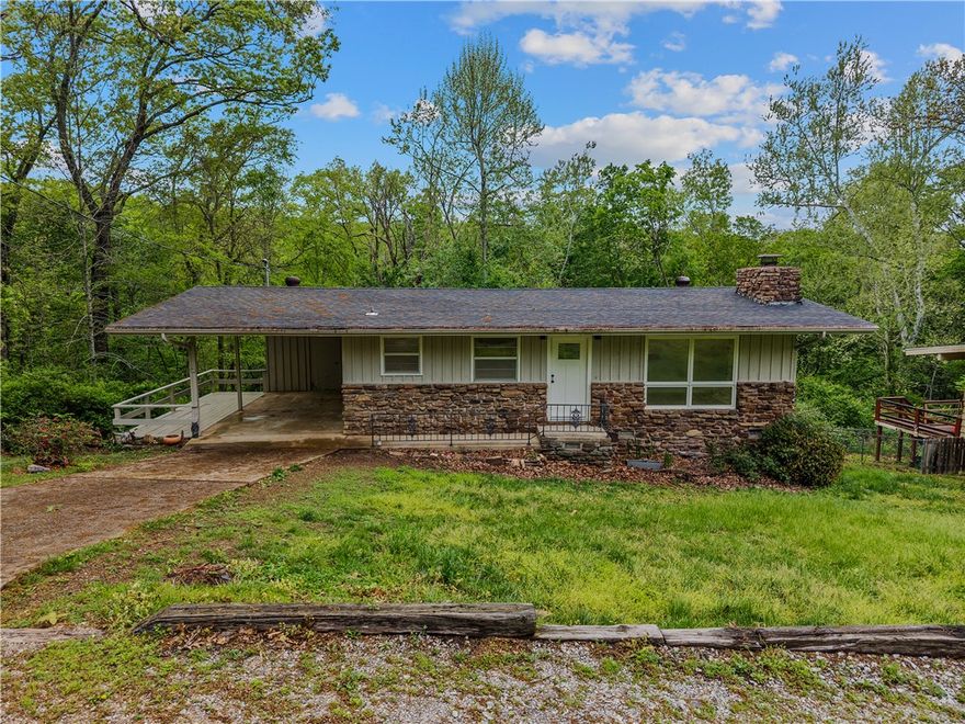 Tucked in the trees in the heart of Bella Vista, this remodeled cottage is the kind of property that works however you need it to. Warm finishes and a wood-burning stove give it the cozy character that feels intentional. Private wooded backyard, natural light, and a layout that just lives well. The unfinished basement adds real upside..expand, add a bunk room, gear/bike storage, or build to fit your vision. Less than half a mile to Lake Avalon, with golf and outdoor recreation right in the neighborhood. First home, weekend getaway, or STR investment..this one checks the box regardless of how you run it.