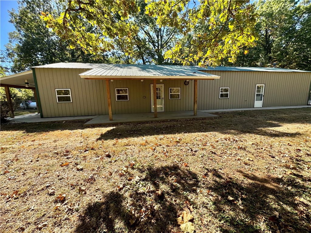 This lovely custom-built home has two bedrooms and two baths on 1/2 acre. The open floor plan with vaulted ceilings creates a spacious and airy atmosphere, perfect for gatherings or simply enjoying some quiet time. The use of poplar and cedar for the custom cabinets adds a touch of natural beauty and durability, and the pull-out drawers and pantry are great for maximizing storage space. Having two water heaters is a smart choice, ensuring a steady supply of hot water, especially if you have guests. The wheelchair accessibility is a thoughtful feature, making the home more inclusive and convenient for everyone. Extra insulation is always a plus, as it helps with energy efficiency and maintaining a comfortable indoor temperature. The fenced yard provides security, and the 20x18 shop building offers ample space for hobbies, storage, or even a small workshop. It's the perfect place to call home!