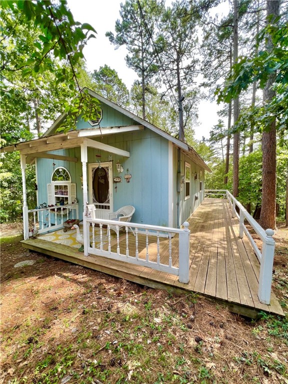 Looking for your own tiny cottage retreat in Eureka Springs? This super cute and cozy cottage is the perfect getaway spot to escape to and recharge your batteries. Just the right size and super energy efficient with very low taxes. This little gem is tucked in at the end of a quiet neighborhood and nestled in the pines. The deck overlooks the wooded lot and has a super private vibe needed for any great escape. The lot is certainly big enough to bring your boat or other water craft and lake toys. You will be less than 30 minutes from either Table Rock Lake or the crystal blue waters of Beaver Lake. Are rivers more your speed, bring your kayak or canoe and enjoy the Buffalo or White rivers. Still room on the truck for your bicycles? Come enjoy all the new trails at Lake Leatherwood city park or the new trails on the grounds of the Great Passion Play. There are so many awesome ways to come enjoy the Natural State and at this price you too can have a second home in this beautiful vacation destination! Paradise awaits