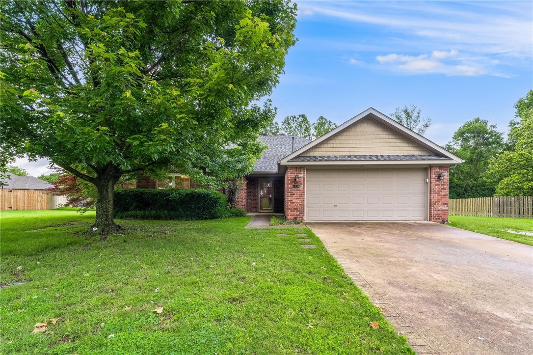 This beautifully maintained 3-bedroom, 2-bath home sits on nearly an acre lot at the end of a quiet cul-de-sac in one of Springdale’s most convenient and sought-after areas! Inside, you’ll find a desirable split floor plan, hardwood flooring throughout, and an open-concept kitchen featuring a movable island, large pantry, and custom cabinetry—blending comfort and style seamlessly. Step outside to a gorgeous backyard retreat, complete with a covered patio and ample space to roam or entertain. A storage building adds even more functionality and flexibility for your lifestyle. Located just minutes from the Johnson Mill District, Arkansas Children’s Hospital, Northwest Medical Center, and some of the area’s most popular restaurants—with quick access to I-49—this location offers convenience whether you’re headed to Fayetteville, Bentonville, or anywhere in between.