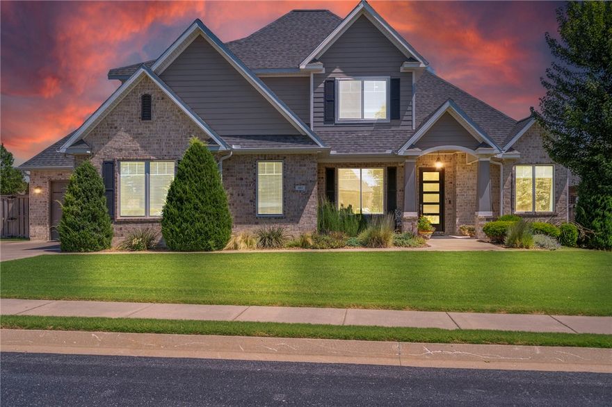 Absolute stunner! This gorgeous home in the prestigious gated community Oak Tree will leave an incredible impression. Impeccably maintained, every inch is designed for beautiful esthetics and perfect function. The chef's kitchen including hidden pantry and spacious dining area are perfect for culinary creations and ease of entertaining. The space extends onto the lovely covered patio complete with outdoor kitchen and wood burning (gas assist) fireplace for year-round enjoyment. The backyard is magical with stone wall, fence and natural landscaping forming a completely private oasis. Plenty of space for a future pool or the active lifestyle. Back indoors, a 2nd bedroom on the main level is perfect for guests, an office, or a kid's room. The primary suite is spacious and inviting with the walk in closet connecting seamlessly to the laundry and drop zone area. The stained concrete and LVP flooring are perfect for active people and pets. Fabulous community amenities are the icing on the cake for this amazing home!