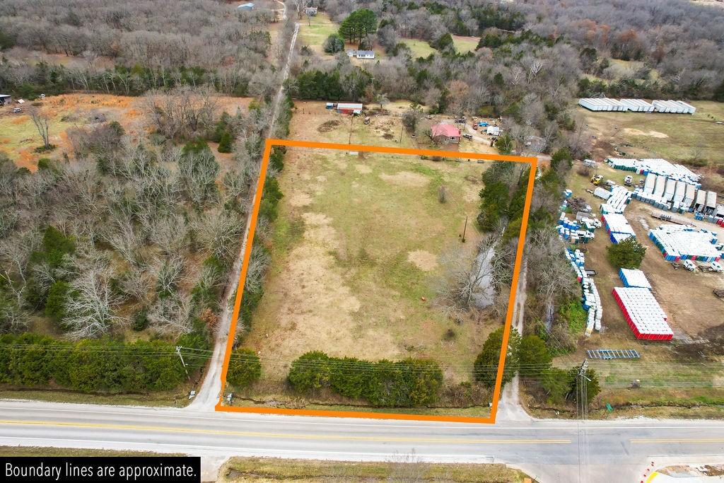Wonderful land with excellent opportunities! versatile property that can be used for either residential or commercial purposes. Spanning over two acres and is located in a rapidly developing area with easy access to major highways and amenities. The land is level, partially cleared, and ready for development, making it an ideal location for building a custom home or a commercial building. Possibilities are endless for potential buyers looking to invest in this prime real estate opportunity. Don't miss out on this one!