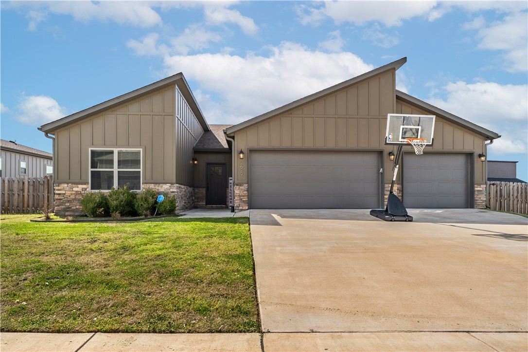 Gorgeous well maintained home in the perfect Fayetteville location! This home was created with a fresh new floor plan to give a modern day feel. With the custom interior design, this home isn't like any other. There is an open concept from kitchen to living and a dining area as well. There has so many upgrades, such as the handmade custom cabinets, granite counter tops, walk in pantry, mudroom, tile in all living areas, blinds on all windows, and a fully fenced in backyard. You'll love the large walk in closet and soaker tub in master bathroom. The split floor plan give you the privacy you need. This home is just minutes from the interstate and less than 10 minutes from the University. It's a quick drive to anywhere you need to go without being in the middle of the Fayetteville traffic.
