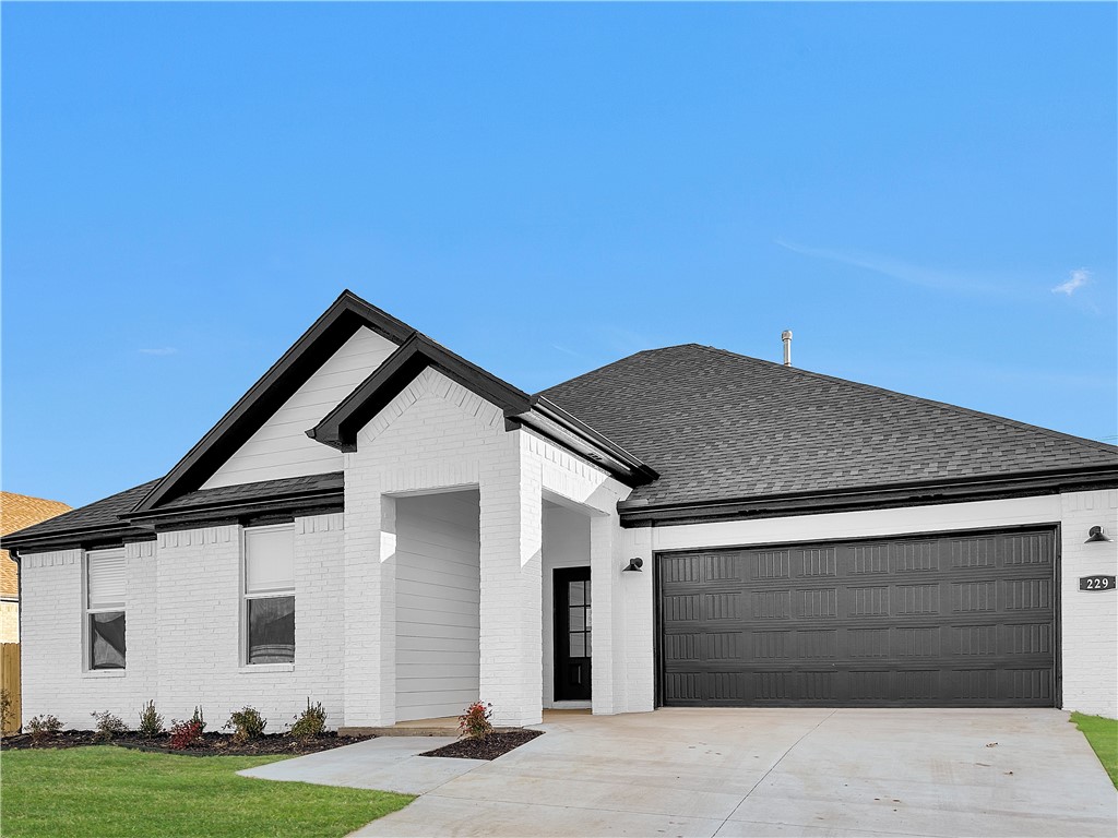 This impressive subdivision, Goose Creek Village, is where quality and affordability meet, in the heart of Farmington. This DEAN floorplan spans across 4 bedrooms and 2 bathrooms. Passing through the foyer, you'll find yourself in the grand combination dining room, kitchen, and living room. This home features a beautiful island, gorgeous quartz kitchen countertops, stainless steel appliances, and a walk-in pantry. Private primary bedroom includes ensuite with quartz countertops, double sinks, oversized-shower and walk-in closet. Living room has a cozy electric fireplace with heater. Luxury Vinyl Plank flooring throughout! Fans in all bedrooms as well as the living room! This home exterior will have 4 sides brick. Covered patio and a landscape package included. Garage door opener! Tankless gas hot water heater.