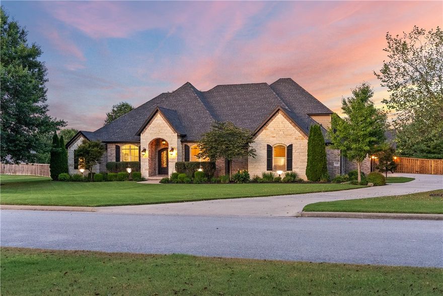 Welcome to this exceptional home on 2 acres in East Fayetteville, designed for both comfort and versatility. Inside, soaring ceilings with exposed beams create a dramatic first impression, while expansive windows overlook the outdoor living area, complete with a sparkling 6-ft pool with a tanning shelf and a Versa Sport Court.
The 5-car garage is a rare find, featuring a drop-down batting cage and an additional finished room with mini split just off the patio area—ideal for hobbies, a game room, or a second office.
This home offers 5 bedrooms, including one customized as a gym with rich wood floors and framed mirrors. The split floorplan provides privacy for the spacious primary suite with a great walk-in closet, while upstairs includes two bedrooms, a full bath, and a secondary living space.
This home blends luxury details, functional spaces, and outdoor amenities, that offer a lifestyle that’s as active as it is comfortable.