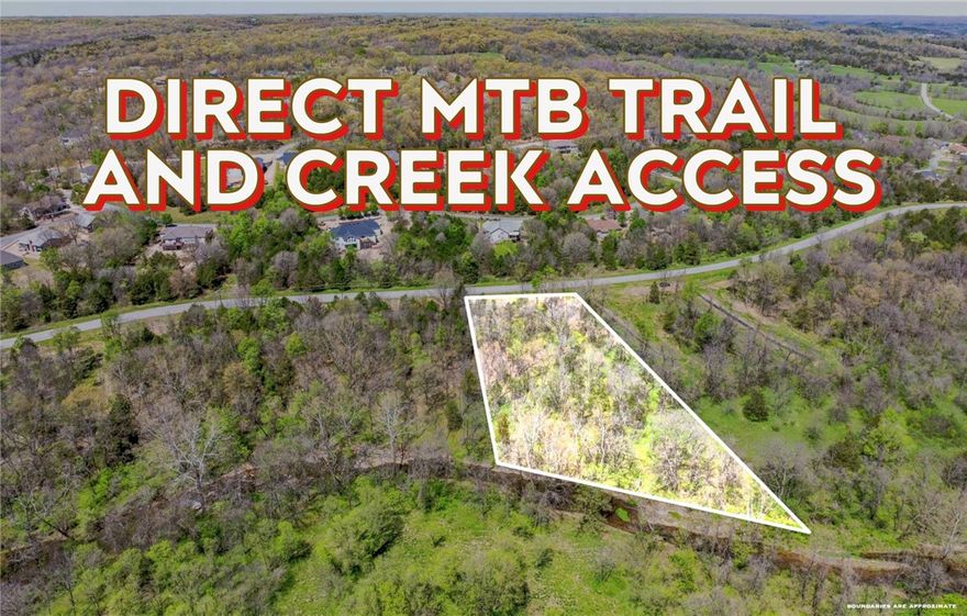 Beautiful one acre lot situated between Tunnel Vision Mountain Bike Trail and Browning Creek! This lot has been cleared and septic approved for a three-bedroom home, ready for you to build.

This prime location offers the best of both worlds - peaceful and natural surroundings with quick access to Interstate 49 for easy commuting.

Flexible options, whether you choose to purchase as raw acreage, or customize builder approved plans.

This is more than a lot - it's the beginning of your Northwest Arkansas dream!