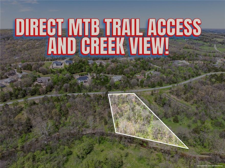 Beautiful one acre lot situated between Tunnel Vision Mountain Bike Trail and Browning Creek! This lot has been cleared and septic approved for a three-bedroom home, ready for you to build.

This prime location offers the best of both worlds - peaceful and natural surroundings with quick access to Interstate 49 for easy commuting.

Flexible options, whether you choose to purchase as raw acreage, or customize builder approved plans.

This is more than a lot - it's the beginning of your Northwest Arkansas dream!