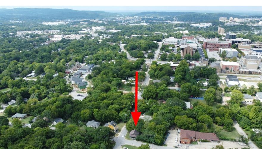 Location, location, location! Don't miss this exciting redevelopment opportunity! Just south of the Washington/Willow Historic District, this property is a short walk or bike ride to Downtown Fayetteville, University of Arkansas, the Fayetteville Square, shopping, restaurants, the Greenway trail, Washington Elementary, Wilson Park, Ozark Natural Foods Co-Op and Fayetteville Public Library. With it being so close to Mount Sequoyah, you are within a couple minutes of one of the best views in NWA! 
Value is in the land and location. Home is sold as-is.