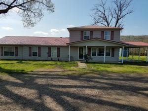 Beautiful green pasture land surrounding this immaculate country home. Roughly 5.95 pristine acres that is manicured perfectly for cows or horses to roam freely on. Inside you'll find gorgeous hardwood floors and 2 large living room. All 4 bedrooms have walk in closets with lots of windows all around for natural sunlight. From the front of the house you can see the ''Magazine National Forest'' sign. Numerous barns and sheds for storage for all your equipment. Come take a look at this rare opportunity for only $199,900!