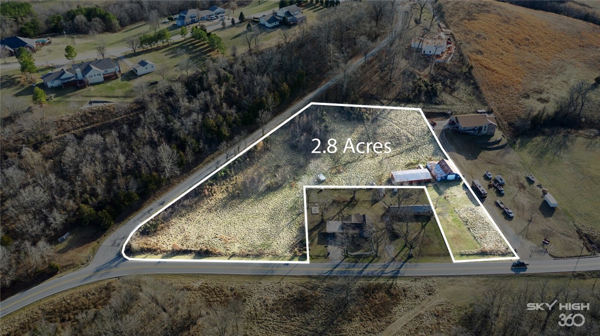 An exceptional tract of land nestled centrally in between Belle Vista, Bentonville, and Pea Ridge. The land sits in a valley along McNelly Rd. This beautiful tract has no restrictions on what you can build here it has two barns on it that are still standing and totally usable. This would be a beautiful place to build your dream home with easy convenience to the cities listed above as well as Rogers, Gravette, Jane, MO, and more. there is public land across the road, anyone, with a POA membership, can venture on. This property regularly has deer grazing on it and other wildlife inhabits this area. This would be an awesome spot to build a home and have a couple of horses so you can utilize the barns and ride the horses throughout the land across the way. The property will need a well and septic and has electricity in the barns so it's there already.