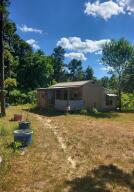 Perfect Hunters Cabin retreat! Completely off the grid Bordered by National Forest. One of a kind 1 bedroom 1 bath cabin on 20 acres m/l. With Solar Panels for electricity, composting toilet, propane range/stove, well, large pond, and wet weather spring. Acreage was logged about 10 years ago. Many possibilities with this property from Building your dream home to keeping it as hunters cabin the choice is yours!