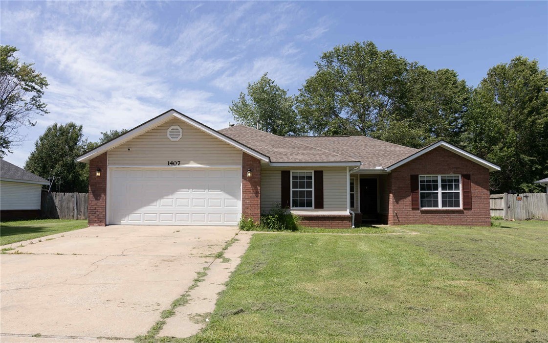 Located in the Gabriel Park Subdivision of Siloam Springs, 1407 Abraham Drive is a charming 4 bedroom, 2 bathroom home offering 1,502 square feet of comfortable living space. The interior features an inviting eat-in kitchen, central gas heating and cooling, ceramic tile and polished concrete flooring, LED lighting throughout, and an attached 2 car garage. Step outside to a generous backyard with a covered patio and storage shed, ideal for relaxing or entertaining. Come see all this home has to offer and schedule your showing today!