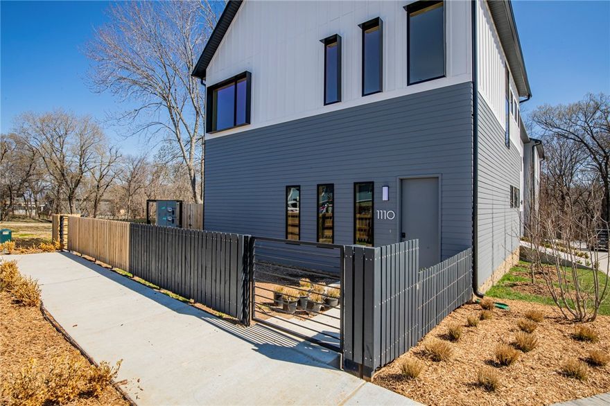 Contemporary home that backs right up on the best mountain biking trails in the nation. This 4 bedroom, 3.5 bath is the very definition of a modern, cool, outdoors enthusiasts dream home. Home has top level finish out: 3 Cm quartz countertops, KitchenAid Appliances, Rift oak cabinets, custom cable railing, white Oak flooring, pella windows, Kohler fixtures, smart capabilities, wired for Tesla charger. Step outside and walk down your direct path to the Slaughter Pen trails of "cry baby" and "boo boo". Half mile to Downtown Bentonville life... restaurants, music, and shops, including the Crystal Bridges trails and museum. 1/8 mile from the Crystal Bridges expansion project, proposed completion 2024. Enjoy the convenience of downtown living, with a little piece of chill and tranquility on the trail system. Call list agent for details. Taxes estimated. Seller related to list agent. Property also listed for lease MLS Number: 1242992.