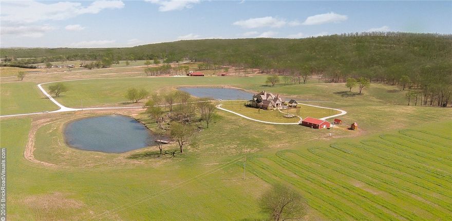 Crystal Springs Ranch provides relaxed estate living. Well-watered by Blair Creek, 2 ponds & 1 strong spring. Crystal Springs creates a sparkling 1 1/2 acre stocked lake below picturesque limestone outcroppings. The porch of the 10 rm home provides a tranquil view of 3 1/2 acre Eagle Lake & the rolling pasture. The country club casual home took 1 1/2 years to complete with painstaking attention to every detail, featuring an elevator, gourmet kitchen, quartz cntrs, Wolf rng, sub-zero ref & butler pantry.