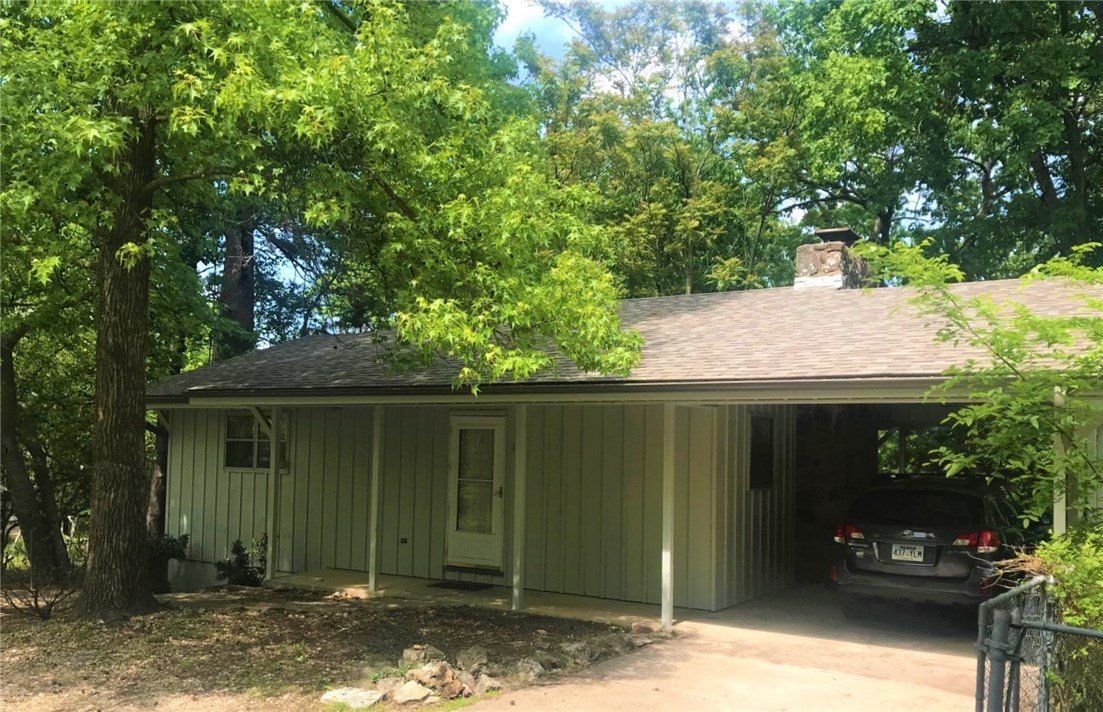 Welcome to this sweet home tucked away on a quiet wooded street. The main level offers a comfortable open floor plan with living, dining and kitchen plus master bed and bath. You'll love the hardwood floors, beautiful stone fireplace and great back deck. The lower level houses a second bed and bath, plus family room, laundry and large storage/bonus room. Then step outside and enjoy the lower patio and the yard. The entire exterior has been recently repainted, with a new roof in 2019 and new hvac in 2017. A little tlc on the interior could transform this home from something simple but comfortable to something truly amazing!
