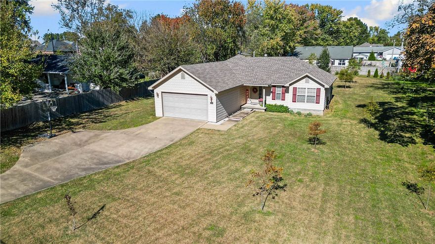 Looking for a home with a large yard at a great price? Here it is! This inviting 3-bedroom, 2-bath home sits on over half an acre in a convenient Pea Ridge location—close to schools, City Park, Walmart, and just minutes to Bentonville or Rogers. Prefer the outdoors? Enjoy nearby Pea Ridge bike trails or hop over to Bella Vista’s renowned trail system.
The living room feels warm and welcoming with its cozy fireplace, with two bedrooms and a full bath just down the hall. The kitchen is tucked just around the corner, and the split floor plan provides privacy with the primary suite on its own side of the home, featuring a spacious en suite bath.
Major systems are in great condition:
• HVAC: 2025
• Roof: 2017
• Water Heater: 2015
There may even be potential for commercial rezoning (buyer to verify)—which makes this property especially unique. Large lots with this much possibility don’t hit the market often.
Be sure to check out the video tour or schedule your private showing today!