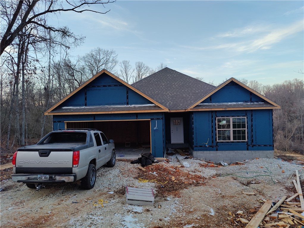 Welcome To Your Next Home! Fantastic 4 Bed New Build On Sewer. Bentonville Schools. Approx 60 Days Out From Completion. Custom Cabinets And Granite Counters Throughout. Wood Like Tile In Main Living Areas, Kitchen, Dining, Halls. Eat-in Dining + Bar Seating At The Island. Master Suite w/ Dual Vanity, Soaker Tub, Tile Shower In Master Bath. Large Walk-in Closet. Still Time To Make Some Selections. Come See!