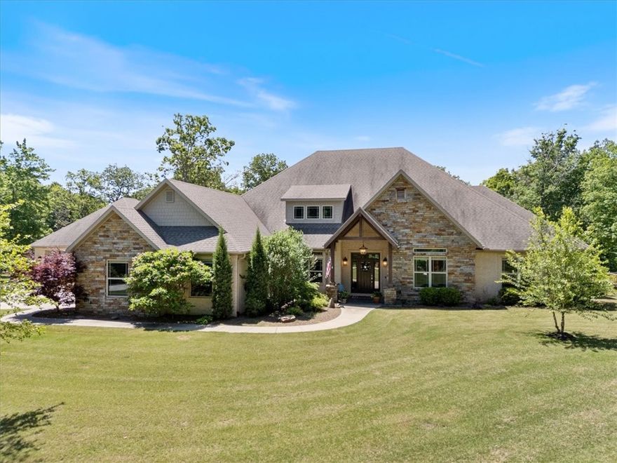 Folks, this ain’t just a home—it’s a high-brow hillbilly haven. A pre-inspected, move-in ready masterpiece where luxury shakes hands with the backwoods. We’re talkin’ a custom brick & stone 4BR/6BA/5CG estate—every bedroom’s got its own full-blown throne room, naturally.
Planted on ~12 private, hardwooded acres on the County-side of the Fayetteville City line, this 2014 custom showcase is kept immaculate. Want even MORE woods? ~5 adjoining acres available for $500K.
Owners have dropped well over $250K on the outdoor portions of this paradise—heated pool, hot tub, stone fireplace, massive porches, and Bermuda sod that feels presidential.
Inside? New HVAC, concrete safe room, heated master bath floors, vaulted ceilings with rustic beams, 8’ doors, built-ins galore, hardwood floors, and a 5-burner propane range that says yes sir to down-home cookin’. 
Also: 1,010 sf climate-controlled ManLand—pool house, garage, shop—all in one.
Legacy for generations starts here. 
Due diligence folder available upon request.