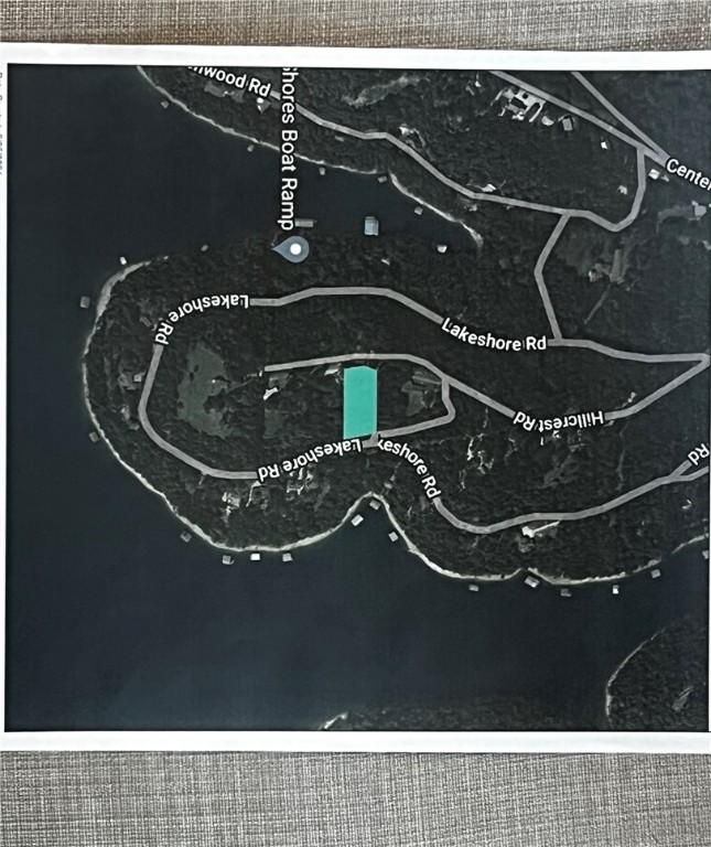 Lake area lot in Sylvan Shores! Breathtaking views of Beaver Lake and everything Sylvan Shores has to offer. There is access to the community boat ramp, which is minutes from the property, and a community well system. Along with this lake life setting, you are also not far from Eureka Springs, and surrounding areas! This lot is ideal for building your dream home!