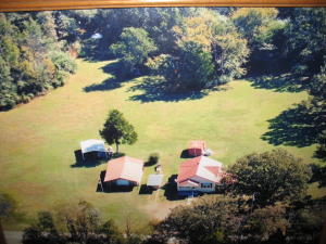 Price Reduced on this Country Home!!HOUSE-SHOP AND OVER 5 ACRES OF LAND.City water and 2 wells.3 Bedroom, 1 bath Half basement
