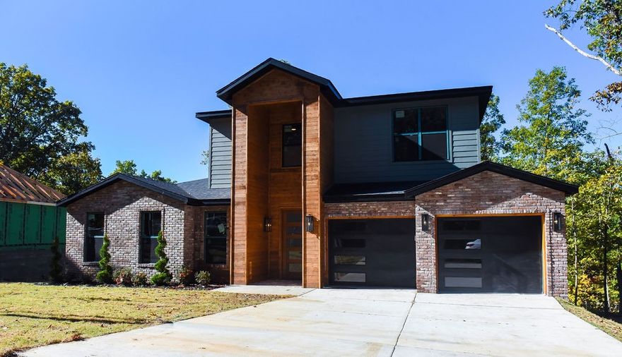 Step into refined living with this stunning new construction home that blends modern design with upscale
finishes throughout. Thoughtfully curated, this home & the premium selections in every detail, exudes
style & quality, both inside & out. The home features 4 bedrooms, with two luxurious primary suites, 3.5
beautifully appointed bathrooms, setting it apart with flexibility & comfort for multi-generational living or
hosting guests. A hidden pantry, upgraded appliances, beautiful staircase, picturesque views, covered deck
with built-in outdoor grill included, & backyard, make it a dream home for the whole family. This feels
more custom than other new build homes—it’s a meticulously crafted residence where contemporary
elegance meets everyday function.