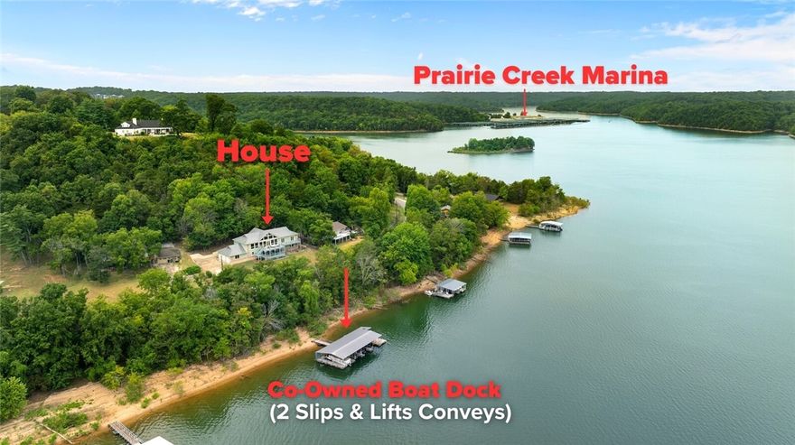 Youāll love this lakefront showstopper featuring soaring glass panels that bring the outdoors in. A rare find, this property is just steps away from the co-owned 4-slip boat dock w/swim deck. Two 10' x 26' slips & lifts convey.  This 4,374 SF retreat balances luxury with comfort, offering multiple entertainment areas that flow seamlessly from indoors to outdoors. The main-level primary suite is a sanctuary including a sitting area, spa-inspired en suite bath and separate laundry room. A second Primary, Family Room, and Laundry Room are located on the lower level, along with an office and fitness room. Significant updates include a remodel of all five bathrooms, installing hardwood floors, new roof, 3 HVAC units, whole-house generator, new septic system, and fresh interior/exterior paint. This is a rare opportunity to claim the lakefront retreat you've long desired.
